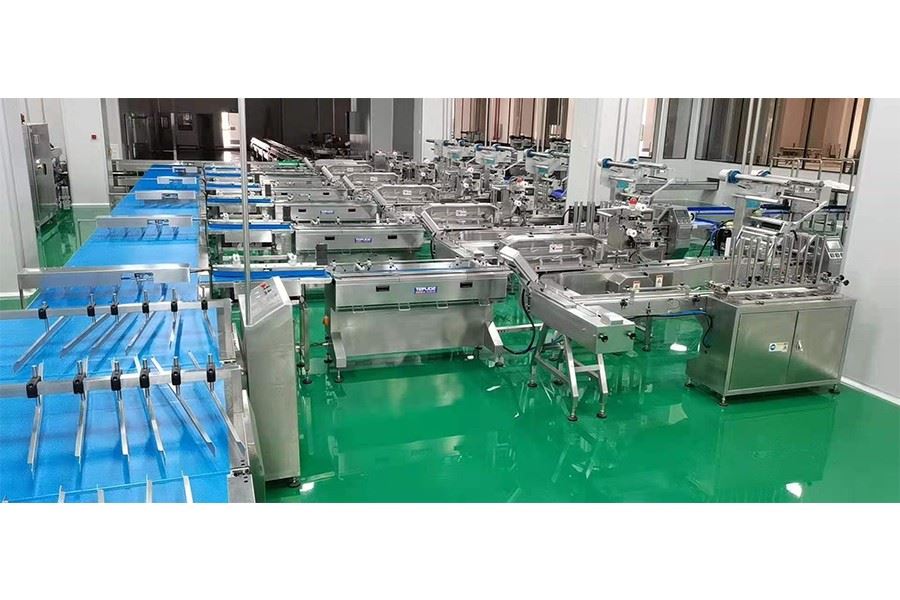 flower cake automatic feeding packaging line wafer packing line flow wrap manufacturer